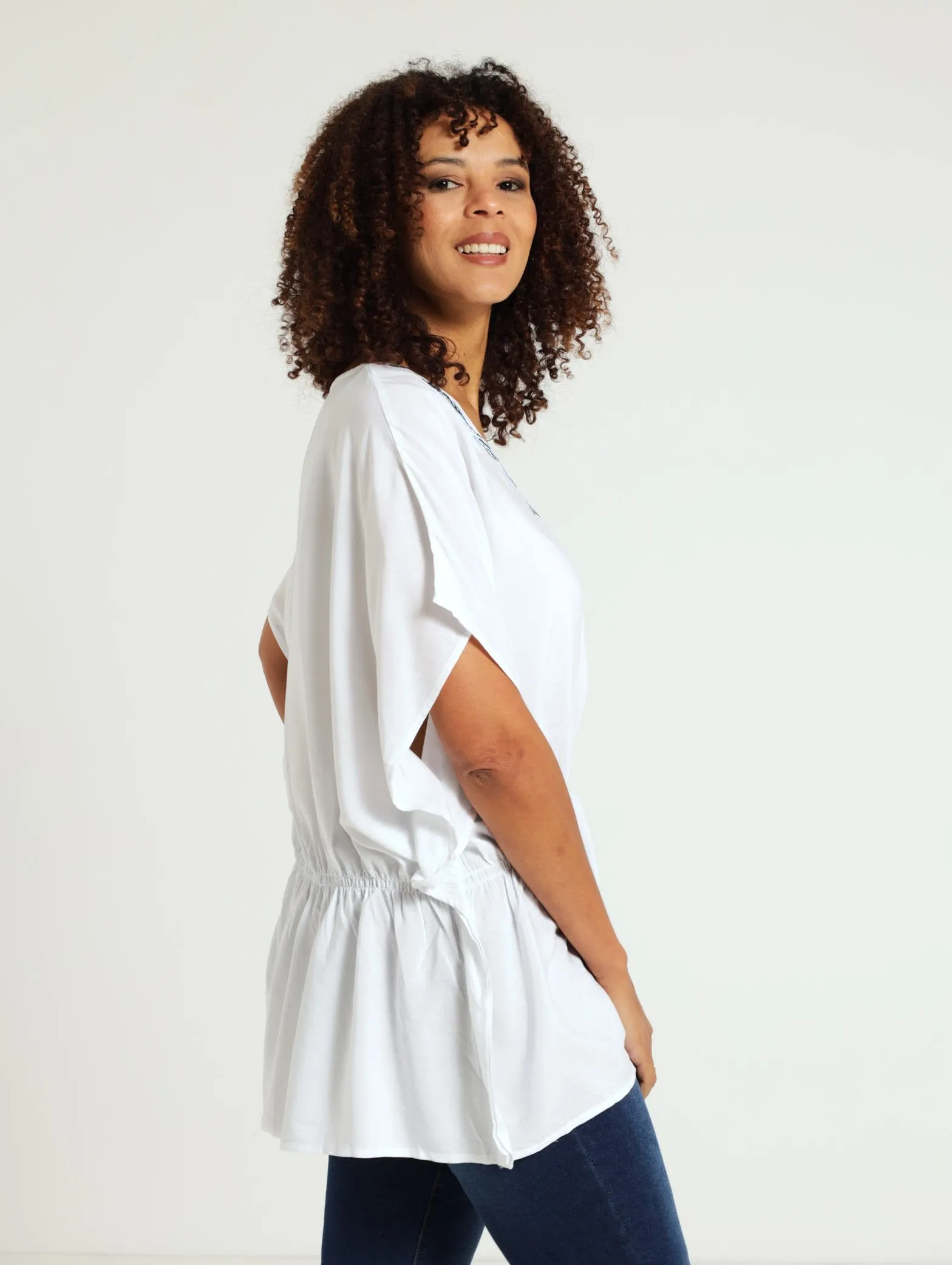 Embroidered Peplum Blouse - White