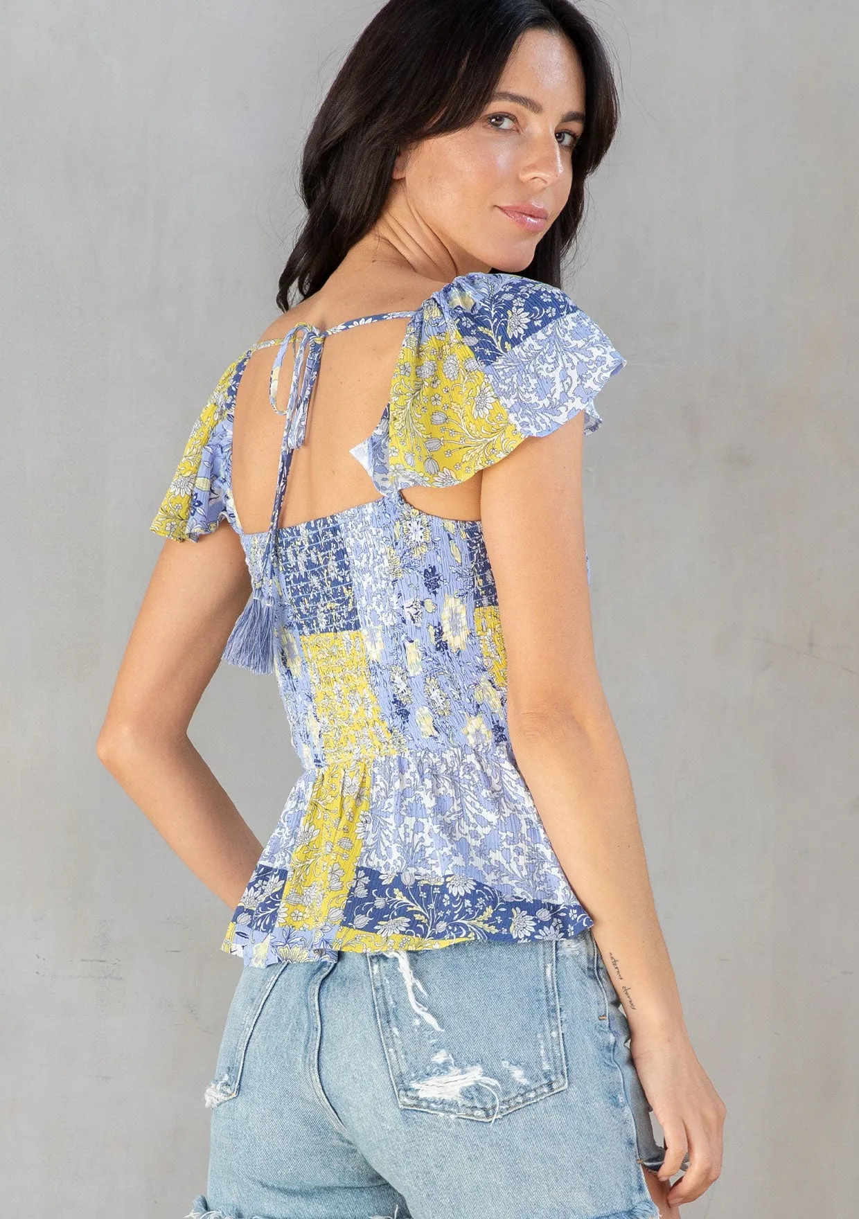 Flutter Sleeve Smocked Peplum Top