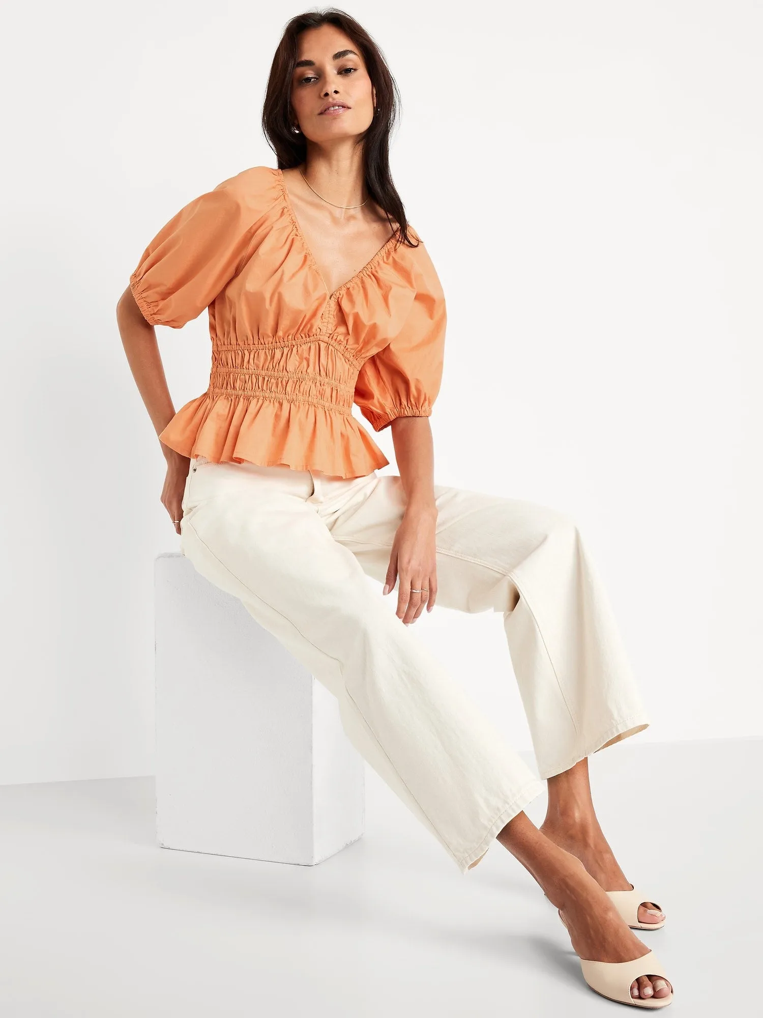 Smocked V-Neck Peplum Top